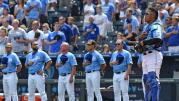 Sep 4, 2016; Kansas City, MO, USA; Kansas City Royals catcher Salvador Perez (13) stands at attention during the National Anthem prior to the start of the game against the Detroit Tigers at Kauffman Stadium. Mandatory Credit: Peter G. Aiken-USA TODAY Sports