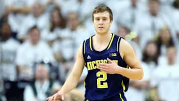 Feb 1, 2015; East Lansing, MI, USA; Michigan Wolverines guard Spike Albrecht (2) dribbles the ball during the first half against the Michigan State Spartans at Jack Breslin Student Events Center. Mandatory Credit: Mike Carter-USA TODAY Sports