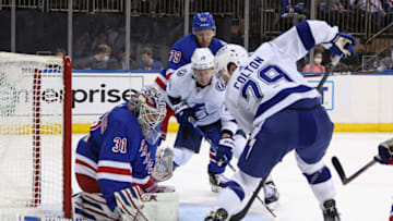 NEW YORK, NEW YORK - JANUARY 02: Igor Shesterkin #31 of the New York Rangers makes the first period save on Ross Colton #79 of the Tampa Bay Lightning at Madison Square Garden on January 02, 2022 in New York City. (Photo by Bruce Bennett/Getty Images)