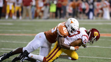 AUSTIN, TX - SEPTEMBER 15: Texas Longhorns LB Anthony Wheeler (45) tackles USC Trojan WR Trevon Sidney (13)during the Texas Longhorns 37 -14 win over the USC Trojans on September 15, 2018, at Darrell K Royal-Texas Memorial Stadium in Austin, Texas. (Photo by John Rivera/Icon Sportswire via Getty Images)