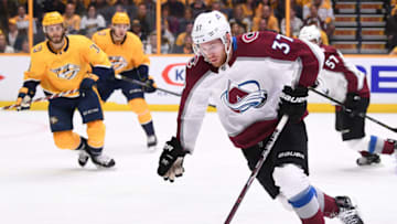 Apr 14, 2018; Nashville, TN, USA; Colorado Avalanche left wing JT Compher (37) skates the puck into the offensive zone during the first period against the Nashville Predators in game two of the first round of the 2018 Stanley Cup Playoffs at Bridgestone Arena. Mandatory Credit: Christopher Hanewinckel-USA TODAY Sports