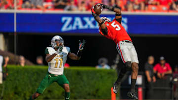 Georgia Bulldogs defensive back Kelee Ringo intercepts a pass over UAB Blazers wide receiver Trea Shropshire. (Photo By: Dale Zanine-USA TODAY Sports)