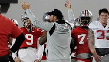 Mar 7, 2023; Columbus, Ohio, USA; Ohio State Buckeyes head coach Ryan Day gathers his team for a huddle at the start of spring football drills at the Woody Hayes Athletic Center. Mandatory Credit: Adam Cairns-The Columbus DispatchFootball Ohio State Buckeyes Football