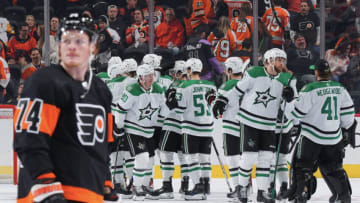 PHILADELPHIA, PA - NOVEMBER 13: The Dallas Stars celebrate as Owen Tippett #74 of the Philadelphia Flyers looks on after the game at the Wells Fargo Center on November 13, 2022 in Philadelphia, Pennsylvania. The Stars defeated the Flyers 5-1. (Photo by Mitchell Leff/Getty Images)