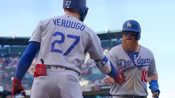 SAN FRANCISCO, CA - JUNE 08: Justin Turner #10 of the Los Angeles Dodgers is congratulated by Alex Verdugo #27 after Turner scored against the San Francisco Giants in the top of the fifth inning of a Major League Baseball game at Oracle Park on June 8, 2019 in San Francisco, California. (Photo by Thearon W. Henderson/Getty Images)