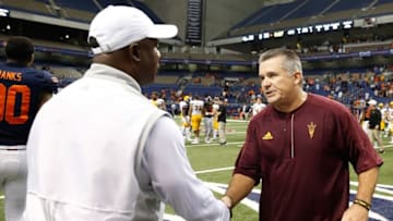 Sep 16, 2016; San Antonio, TX, USA; UTSA Roadrunners head coach Frank Wilson (left) and Arizona State Sun Devils head coach Todd Graham (right) shake hands after the game at Alamodome. The Sun Devils defeated the UTSA Roadrunners 32-28. Mandatory Credit: Soobum Im-USA TODAY Sports