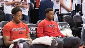 May 23, 2016; Toronto, Ontario, CAN; Toronto Raptors guard DeMar DeRozan (10) and Toronto Raptors guard Kyle Lowry (7) prior to the start of game four of the Eastern conference finals of the NBA Playoffs against the Cleveland Cavaliers at Air Canada Centre. The Toronto Raptors won 105-99. Mandatory Credit: Nick Turchiaro-USA TODAY Sports