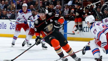 ANAHEIM, CA - JANUARY 23: Corey Perry #10 of the Anaheim Ducks skates with the puck against Ryan McDonagh #27 of the New York Rangers during the game on January 23, 2018 at Honda Center in Anaheim, California. (Photo by Debora Robinson/NHLI via Getty Images)