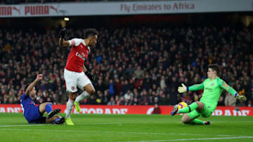 LONDON, ENGLAND - JANUARY 19: Kepa Arrizabalaga of Chelsea saves a shot from Pierre-Emerick Aubameyang of Arsenal during the Premier League match between Arsenal FC and Chelsea FC at Emirates Stadium on January 19, 2019 in London, United Kingdom. (Photo by Catherine Ivill/Getty Images)