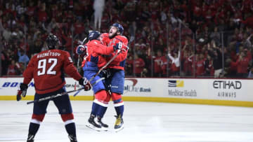 WASHINGTON, DC - MAY 05: Jakub Vrana #13 of the Washington Capitals celebrates with Alex Ovechkin #8 after scoring a third period goal against the Pittsburgh Penguins in Game Five of the Eastern Conference Second Round during the 2018 NHL Stanley Cup Playoffs at Capital One Arena on May 5, 2018 in Washington, DC. (Photo by Patrick McDermott/NHLI via Getty Images)