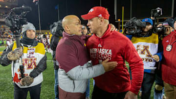 Oct 12, 2019; Minneapolis, MN, USA; Minnesota Golden Gophers head coach P.J. Fleck and Nebraska Cornhuskers head coach Scott Frost shake hands after the game at TCF Bank Stadium. Mandatory Credit: Jesse Johnson-USA TODAY Sports