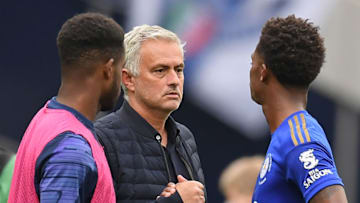 Tottenham Hotspur's Jose Mourinho, Leicester City's Demarai Gray (Photo by MICHAEL REGAN/POOL/AFP via Getty Images)
