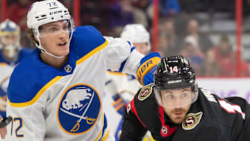 Nov 16, 2022; Ottawa, Ontario, CAN; Buffalo Sabres right wing Tage Thompson (72) and Ottawa Senators left wing Tyler Motte (14) follow the puck after facing off in the first period at the Canadian Tire Centre. Mandatory Credit: Marc DesRosiers-USA TODAY Sports