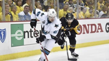 Jun 1, 2016; Pittsburgh, PA, USA; San Jose Sharks center Tomas Hertl (48) controls the puck against Pittsburgh Penguins defenseman Kris Letang (58) in the third period in game two of the 2016 Stanley Cup Final at Consol Energy Center. Mandatory Credit: Don Wright-USA TODAY Sports