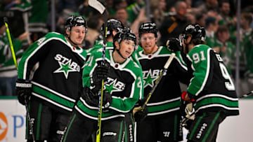 Nov 25, 2022; Dallas, Texas, USA; Dallas Stars left wing Jason Robertson (21) and center Roope Hintz (24) and center Joe Pavelski (16) and center Tyler Seguin (91) celebrates Robertson scoring the game tying goal against the Winnipeg Jets during the third period at the American Airlines Center. Mandatory Credit: Jerome Miron-USA TODAY Sports