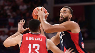 France's Rudy Gobert passes the ball during the FIBA Basketball World Cup 2023 Preparation match between France and Tunisia in Pau, southwestern France, on July 31, 2023. (Photo by GAIZKA IROZ / AFP) (Photo by GAIZKA IROZ/AFP via Getty Images)