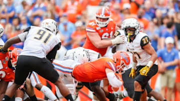 GAINESVILLE, FLORIDA - SEPTEMBER 28: Kyle Trask #11 of the Florida Gators scores a touchdown in the second quarter against the Towson Tigers at Ben Hill Griffin Stadium on September 28, 2019 in Gainesville, Florida. (Photo by James Gilbert/Getty Images)