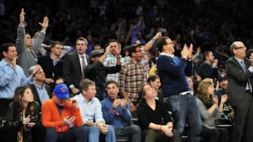 Feb 13, 2013; New York, NY, USA; New York Knicks fans celebrate against the Toronto Raptors during the second half at Madison Square Garden. The Raptors won the game 92-88. Mandatory Credit: Joe Camporeale-USA TODAY Sports