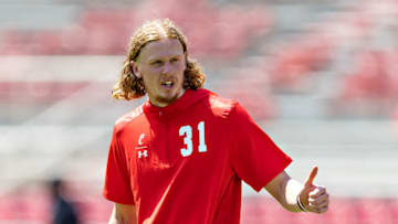 Mason Fletcher of the Cincinnati Bearcats warms up before a game against the Arkansas Razorbacks. Getty Images.