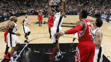 Jan 27, 2016; San Antonio, TX, USA; San Antonio Spurs small forward Kawhi Leonard (2) pulls down a rebound during the first half against the Houston Rockets at AT&T Center. Mandatory Credit: Soobum Im-USA TODAY Sports