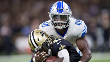 NEW ORLEANS, LA - OCTOBER 15: Jarrad Davis #40 of the Detroit Lions tackles Alvin Kamara #41 of the New Orleans Saints at Mercedes-Benz Superdome on October 15, 2017 in New Orleans, Louisiana. The Saints defeated the Lions 52-38. (Photo by Wesley Hitt/Getty Images)