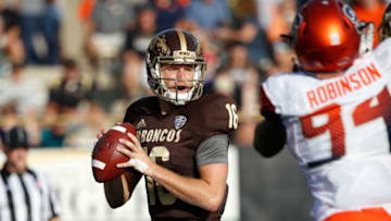 KALAMAZOO, MI - AUGUST 31: Jon Wassink #16 of the Western Michigan Broncos looks to pass against the Syracuse Orange in the first quarter of a game at Waldo Stadium on August 31, 2018 in Kalamazoo, Michigan. (Photo by Joe Robbins/Getty Images)