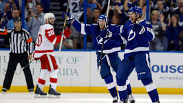 TAMPA, FL - APRIL 29: Braydon Coburn #55 of the Tampa Bay Lightning celebrates his goal with teammate Steven Stamkos #91 against the Detroit Red Wings in Game Seven of the Eastern Conference Quarterfinals during the 2015 NHL Stanley Cup Playoffs at Amalie Arena on April 29, 2015 in Tampa, Florida. (Photo by Mike Carlson/Getty Images)