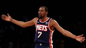 NEW YORK, NEW YORK - NOVEMBER 27: Kevin Durant #7 of the Brooklyn Nets reacts in the fourth quarter against the Phoenix Suns at Barclays Center on November 27, 2021 in New York City. The Phoenix Suns defeated the Brooklyn Nets 113-107. NOTE TO USER: User expressly acknowledges and agrees that, by downloading and or using this photograph, User is consenting to the terms and conditions of the Getty Images License Agreement. (Photo by Elsa/Getty Images)