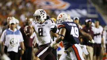 Sep 17, 2016; Auburn, AL, USA; Texas A&M quarterback Trevor Knight (8) runs for a first down during the second quarter against the Auburn Tigers at Jordan Hare Stadium. Mandatory Credit: John Reed-USA TODAY Sports