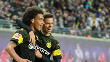 LEIPZIG, GERMANY - JANUARY 19: Axel Witsel celebrates the opening goal with Julian Weigl of Dortmund during the Bundesliga match between RB Leipzig and Borussia Dortmund at Red Bull Arena on January 19, 2019 in Leipzig, Germany. (Photo by Karina Hessland-Wissel/Bongarts/Getty Images)