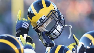 SOUTH BEND, IN - SEPTEMBER 06: Michigan Wolverine players gather during warm-ups before a game against the Notre Dame Fighting Irish at Notre Dame Stadium on September 6, 2014 in South Bend, Indiana. Notre Dame defeated Michigan 31-0. (Photo by Jonathan Daniel/Getty Images)