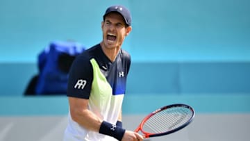 Britain's Andy Murray reacts to Australia's Nick Kyrgios during their first round men's singles match at the ATP Queen's Club Championships tennis tournament in west London on June 19, 2018. (Photo by Glyn KIRK / AFP) (Photo credit should read GLYN KIRK/AFP/Getty Images)