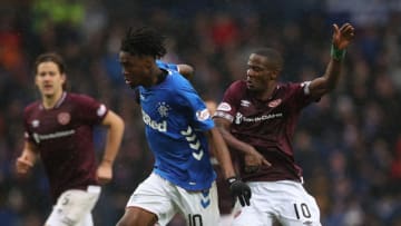GLASGOW, SCOTLAND - OCTOBER 07: Ovie Ejaria of Rangers vies with Arnaud Djoum of Heart of Midlothian during the Scottish Ladbrokes Premiership match between Rangers and Hearts at Ibrox Stadium on October 7, 2018 in Glasgow, Scotland. (Photo by Ian MacNicol/Getty Images)
