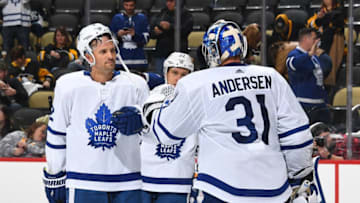 PITTSBURGH, PA - NOVEMBER 03: Frederik Andersen #31 celebrates with Ron Hainsey #2 of the Toronto Maple Leafs after a 5-0 win over the Pittsburgh Penguins at PPG Paints Arena on November 3, 2018 in Pittsburgh, Pennsylvania. (Photo by Joe Sargent/NHLI via Getty Images)