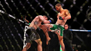 ATLANTIC CITY, NEW JERSEY - JUNE 10: Brendan Loughnane of England and Tyler Diamond of the United States exchange blows during the featherweight bout in Ovation Hall at Ocean Casino Resort on June 10, 2021 in Atlantic City, New Jersey. (Photo by Elsa/Getty Images)