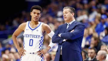 LEXINGTON, KY - NOVEMBER 20: John Calipari the head coach of the Kentucky Wildcats gives instructions to Quade Green
