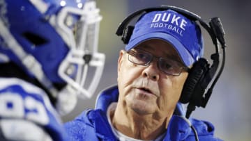 DURHAM, NC - NOVEMBER 30: Head coach David Cutcliffe of the Duke Blue Devils talks to a player in the first half of the game against the Miami Hurricanes at Wallace Wade Stadium on November 30, 2019 in Durham, North Carolina. (Photo by Joe Robbins/Getty Images)
