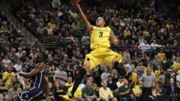 Dec 21, 2013; Eugene, OR, USA; Oregon Ducks guard Joseph Young (3) jumps while shooting the ball against the Brigham Young Cougars at Matthew Knight Arena. Mandatory Credit: Scott Olmos-USA TODAY Sports
