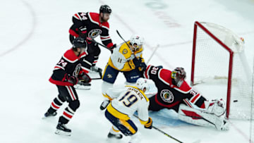Mar 28, 2021; Chicago, Illinois, USA; Nashville Predators center Calle Jarnkrok (19) shoots and scores on Chicago Blackhawks goaltender Malcolm Subban (30) during the first period at United Center. Mandatory Credit: David Banks-USA TODAY Sports