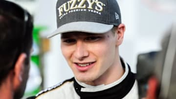 Jul 10, 2016; Newton, IA, USA; Verizon Indy Car driver Josef Newgarden (21) talks with reporters after his victory at the Iowa Corn 300 at Iowa Speedway. Mandatory Credit: Jeffrey Becker-USA TODAY Sports