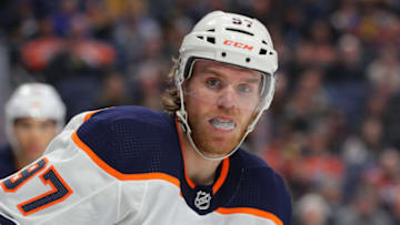 BUFFALO, NY - JANUARY 02: Connor McDavid #97 of the Edmonton Oilers looks for the puck against the Buffalo Sabres at KeyBank Center on January 2, 2020 in Buffalo, New York. Buffalo beats Edmonton 3 to 2. (Photo by Timothy T Ludwig/Getty Images)