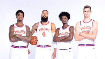 PHOENIX, AZ - SEPTEMBER 25: Marquese Chriss #0, Tyson Chandler #4, Josh Jackson #20, and Dragan Bender #35 of the Phoenix Suns pose for a portrait at the Talking Stick Resort Arena in Phoenix, Arizona. NOTE TO USER: User expressly acknowledges and agrees that, by downloading and or using this Photograph, user is consenting to the terms and conditions of the Getty Images License Agreement. Mandatory Copyright Notice: Copyright 2017 NBAE (Photo by Barry Gossage/NBAE via Getty Images)