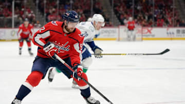 WASHINGTON, DC - NOVEMBER 23: Evgeny Kuznetsov #92 of the Washington Capitals skates with the puck in the first period against the Vancouver Canucks at Capital One Arena on November 23, 2019 in Washington, DC. (Photo by Patrick McDermott/NHLI via Getty Images)