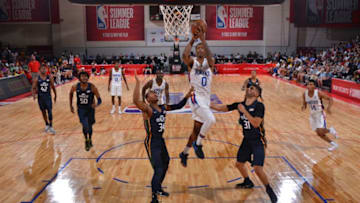 LAS VEGAS, NV - JULY 8: Troy Williams #0 of the New York Knicks shoots the ball against the Utah Jazz during the 2018 Las Vegas Summer League on July 8, 2018 at the Cox Pavilion in Las Vegas, Nevada. Copyright 2018 NBAE (Photo by Bart Young/NBAE via Getty Images)