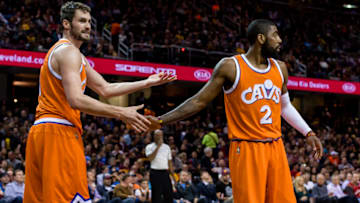 CLEVELAND, OH - MARCH 31: Kevin Love #0 and Kyrie Irving #2 of the Cleveland Cavaliers celebrate after a play during the first half against the Philadelphia 76ers at Quicken Loans Arena on March 31, 2017 in Cleveland, Ohio. NOTE TO USER: User expressly acknowledges and agrees that, by downloading and/or using this photograph, user is consenting to the terms and conditions of the Getty Images License Agreement. (Photo by Jason Miller/Getty Images)