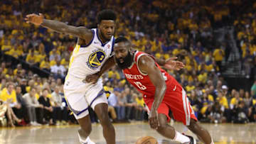 OAKLAND, CA - MAY 26: James Harden #13 of the Houston Rockets drives with the ball against Jordan Bell #2 of the Golden State Warriors during Game Six of the Western Conference Finals in the 2018 NBA Playoffs at ORACLE Arena on May 26, 2018 in Oakland, California. NOTE TO USER: User expressly acknowledges and agrees that, by downloading and or using this photograph, User is consenting to the terms and conditions of the Getty Images License Agreement. (Photo by Ezra Shaw/Getty Images)