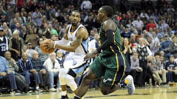 Mar 4, 2016; Memphis, TN, USA; Memphis Grizzlies guard Mike COnley (11) drives against Utah Jazz guard Shelvin Mack (8) at FedExForum. Memphis defeated Utah 94-88. Mandatory Credit: Nelson Chenault-USA TODAY Sports
