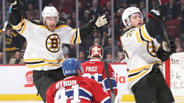 Dec 12, 2016; Montreal, Quebec, CAN; Boston Bruins center Austin Czarnik (27) celebrates his goal against Montreal Canadiens goalie Carey Price (31) with teammate right wing Jimmy Hayes (11) and left wing Paul Byron (41) during the second period at Bell Centre. Mandatory Credit: Jean-Yves Ahern-USA TODAY Sports