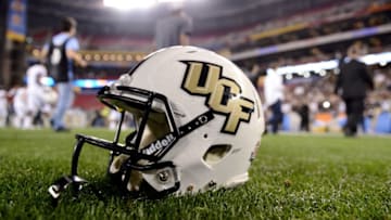 GLENDALE, AZ - JANUARY 01: A UCF Knights helmet sits on the field after the UCF Knights defeated the Baylor Bears 52-42 in the Tostitos Fiesta Bowl at University of Phoenix Stadium on January 1, 2014 in Glendale, Arizona. (Photo by Jennifer Stewart/Getty Images)