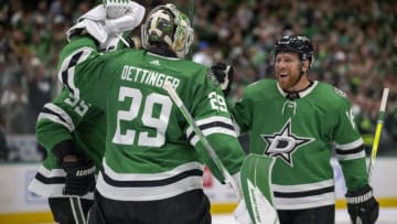 Oct 12, 2023; Dallas, Texas, USA; Dallas Stars goaltender Jake Oettinger (29) and center Matt Duchene (95) and center Joe Pavelski (16) celebrate after the Stars defeat the St. Louis Blues in the overtime shootout period at the American Airlines Center. Mandatory Credit: Jerome Miron-USA TODAY Sports